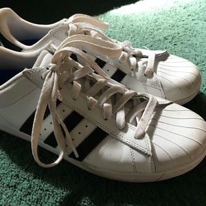 White Adidas Superstars